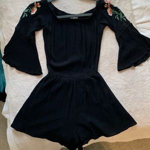 cute romper from the brand “love fire” in the size xs (should fit kids or women)